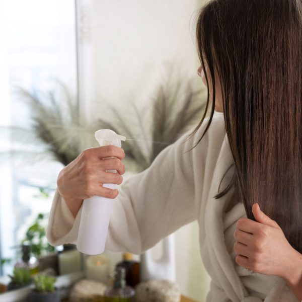 medium-shot-woman-hair-slugging-night-routine (1)